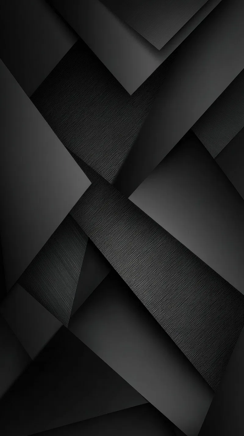 Matte and glossy diagonal planes stack across each other, thin bright seams marking where the edges meet.