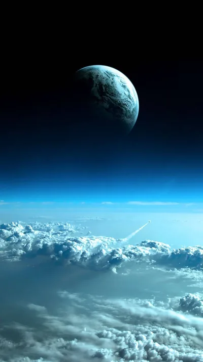 Planet Rising Over a Sea of Clouds HD Phone Wallpaper