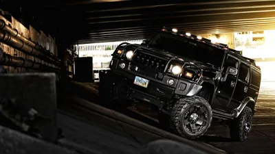 Blacked-Out Hummer H2 Under a Bridge HD Wallpaper