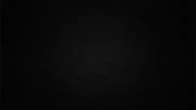 Pure Black with Soft Radial Grain HD Wallpaper