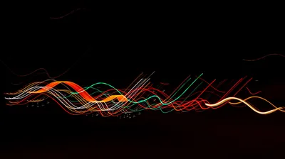 Coloured Light Trails on Black HD Wallpaper