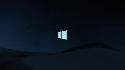 Windows Logo Over Dark Dunes HD Wallpaper
