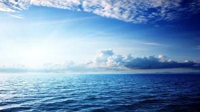Calm Open Ocean Meeting a Bright Sky HD Wallpaper