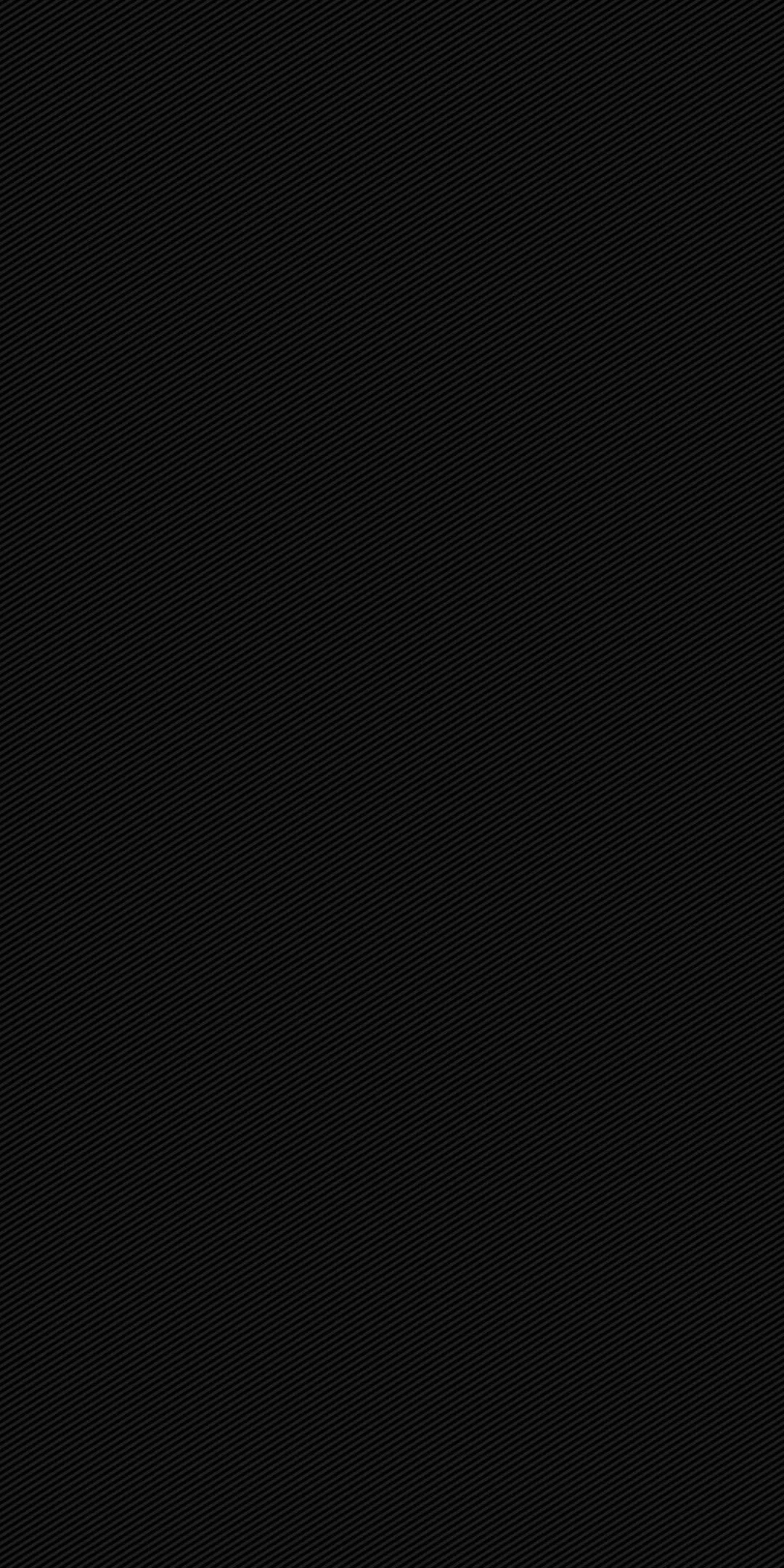 An almost featureless black panel with a fine canvas grain running through it, dark enough to read as solid on an OLED screen.