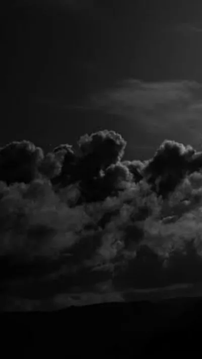 Dark Clouds Over a Hillside HD Phone Wallpaper
