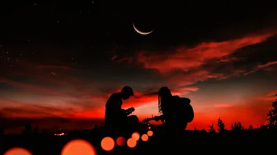 Couple on a Ridge Under a Red Sky HD Wallpaper