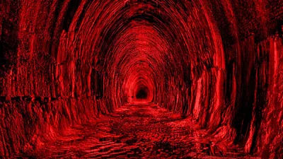 Rock Tunnel Lit in Deep Red HD Wallpaper
