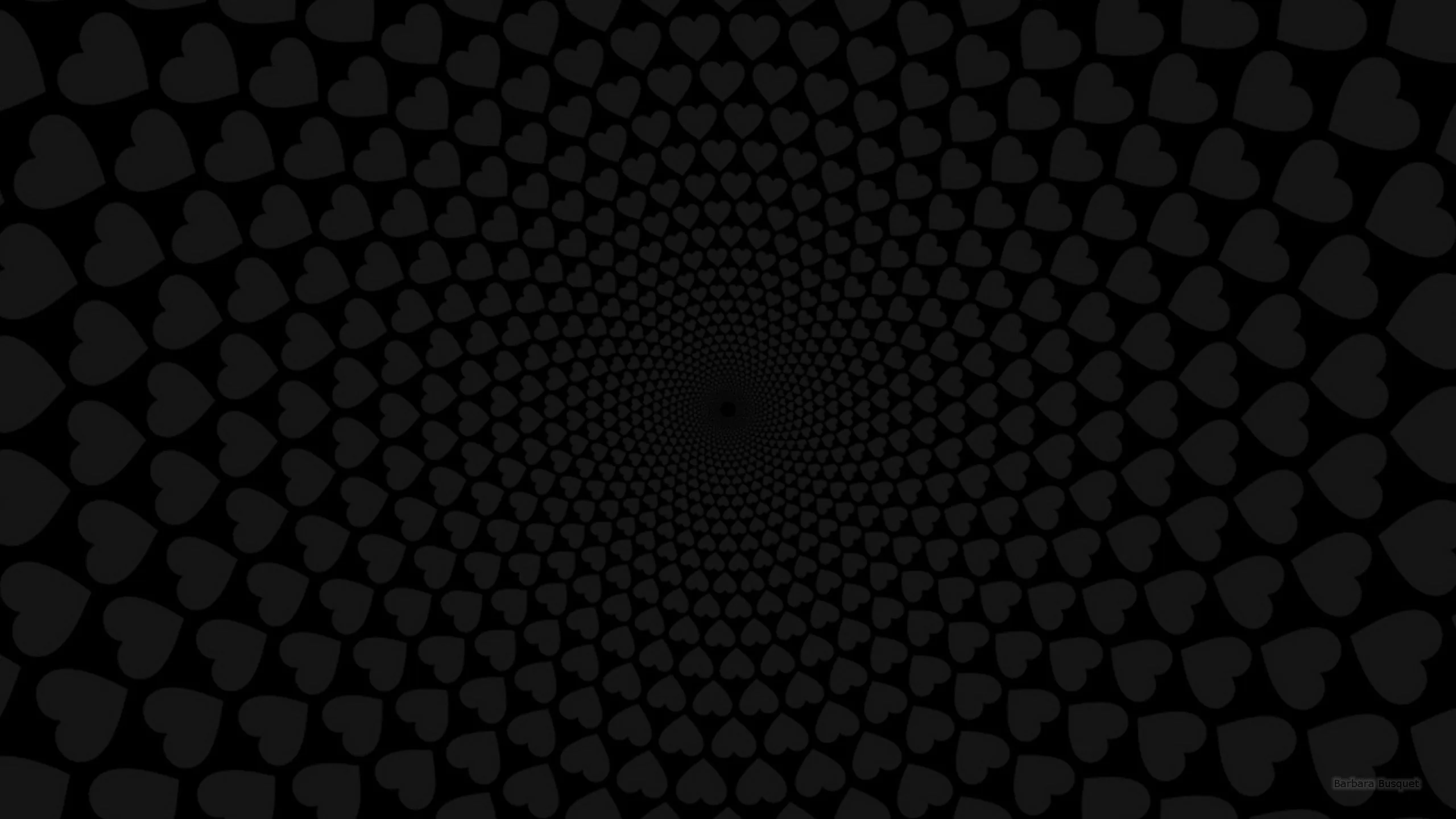 Rows of small hearts wind inward in a tightening spiral toward a point at the centre, the whole vortex kept a shade or two above true black.