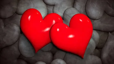 Two Glossy Red Hearts on Stone HD Wallpaper
