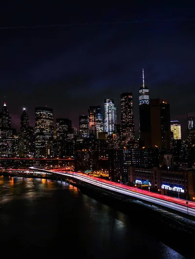Exploring the Glowing Lights of Night City Aesthetic Wallpaper