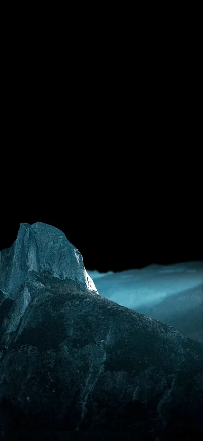 Moonlit Rock Face Above Blue Mist HD Phone Wallpaper