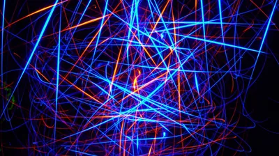 Tangled Laser Streaks on Black HD Wallpaper