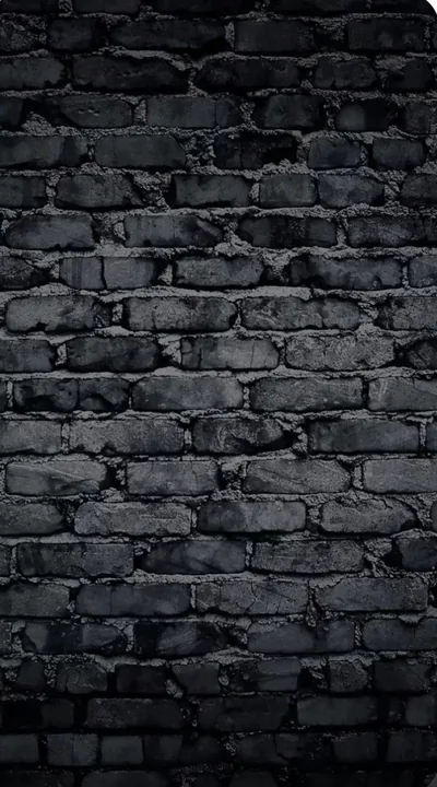 Chipped Black Brick Wall Portrait Shot HD Phone Wallpaper