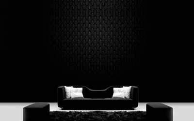Black Sofa Against a Textured Feature Wall HD Wallpaper