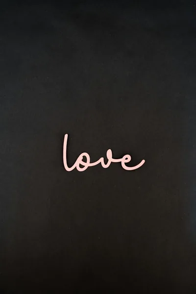 Pink Cursive Love on a Black Wall HD Phone Wallpaper