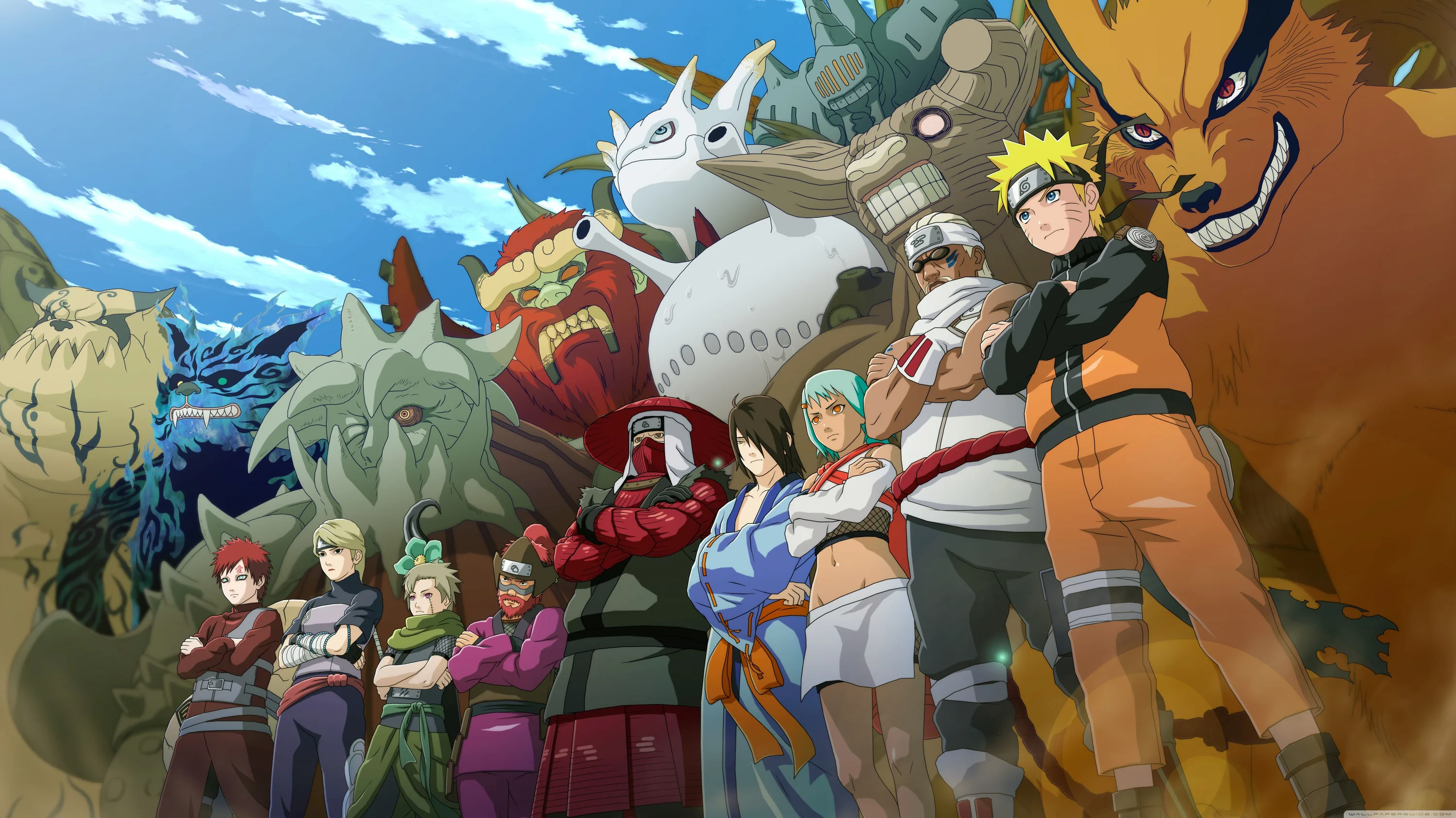 The full Konoha cast stands shoulder to shoulder under a bright sky, the tailed beasts towering behind them and Kurama's orange fur closing the right edge.