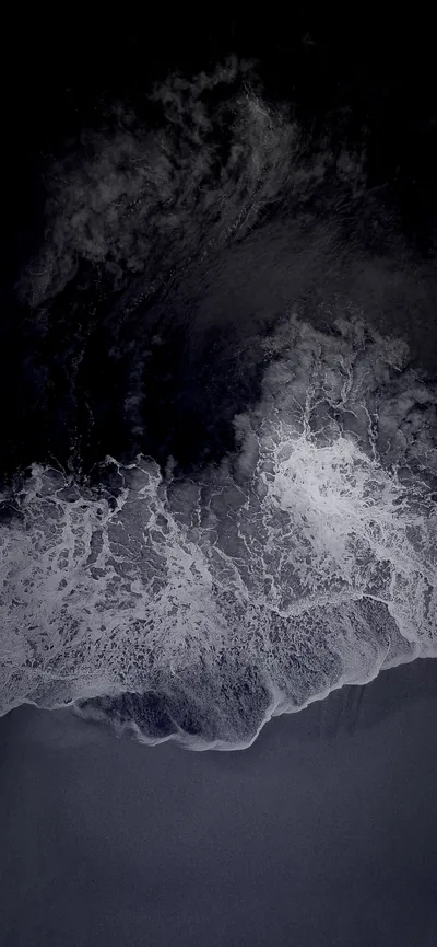 Foam Breaking on a Dark Shore from Above HD Phone Wallpaper