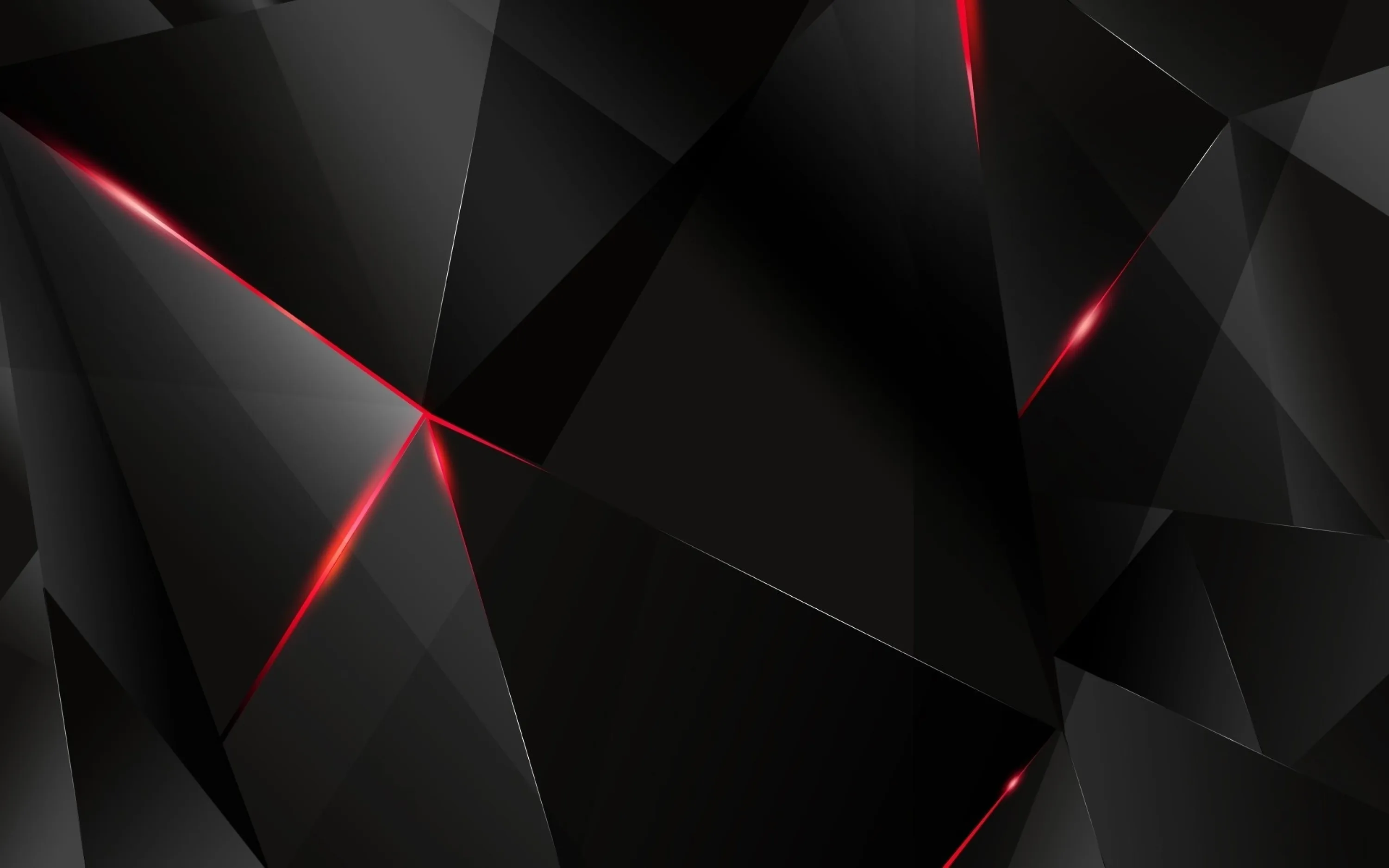 Angular low-poly facets tilt across the frame with red light bleeding through the seams, brightest along the left edge.