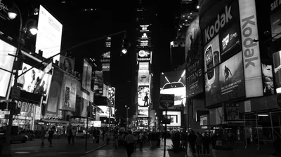 Neon Billboards Over a Crowded Night Street HD Wallpaper
