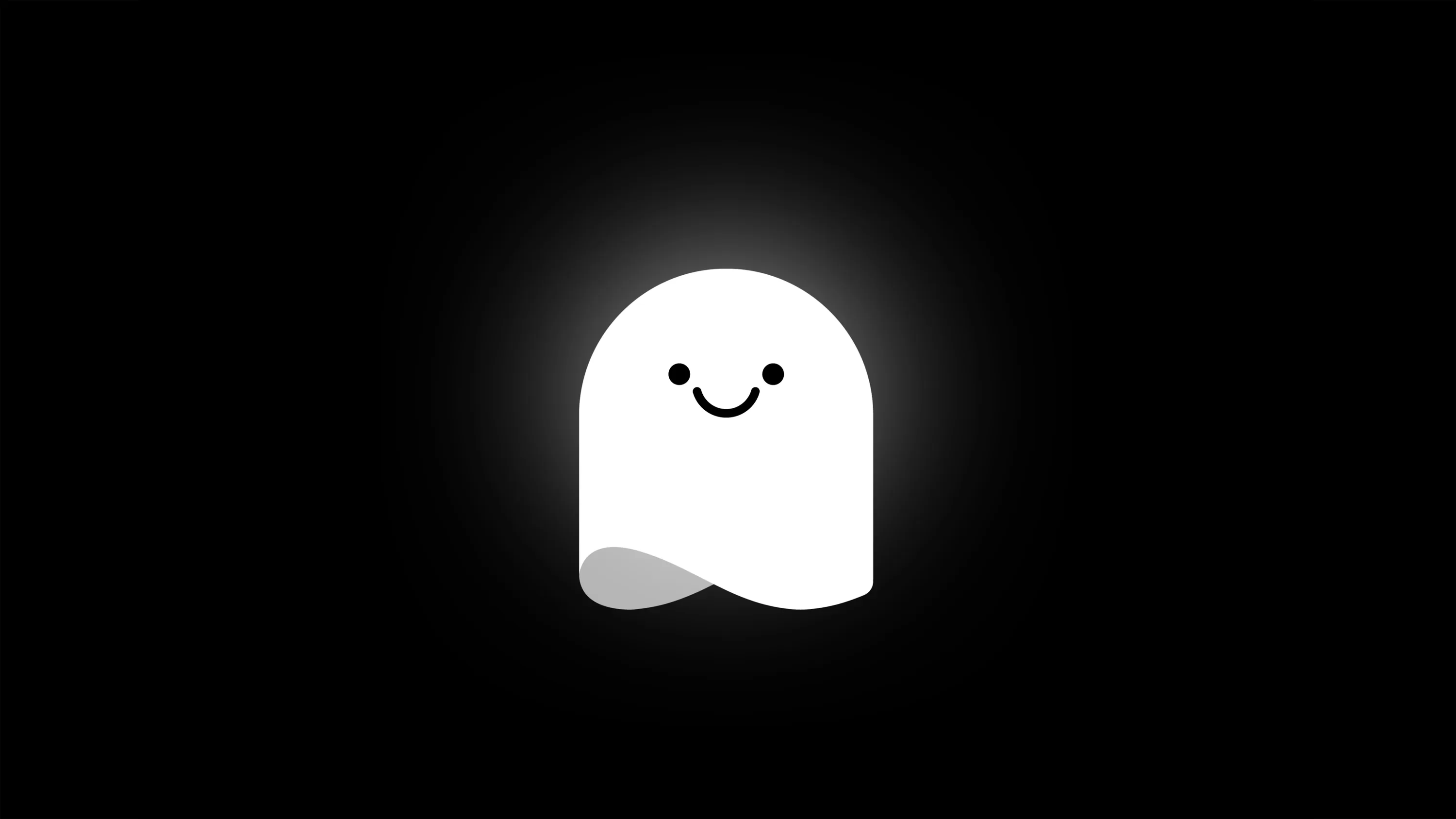 A rounded cartoon ghost glows soft white at the centre of a black field, two dot eyes and a curved smile the only detail.