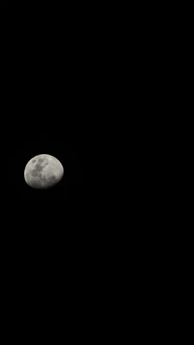 Moon in a Black Night Sky HD Phone Wallpaper