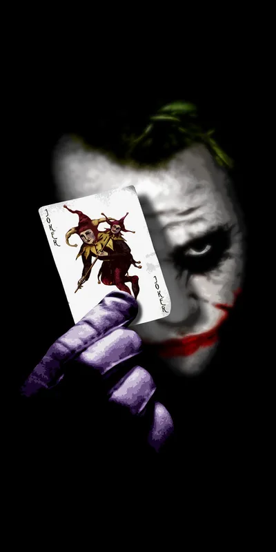 A joker playing card held in a purple glove hides half the painted face, everything outside the card and glove dropping to pure black for AMOLED.