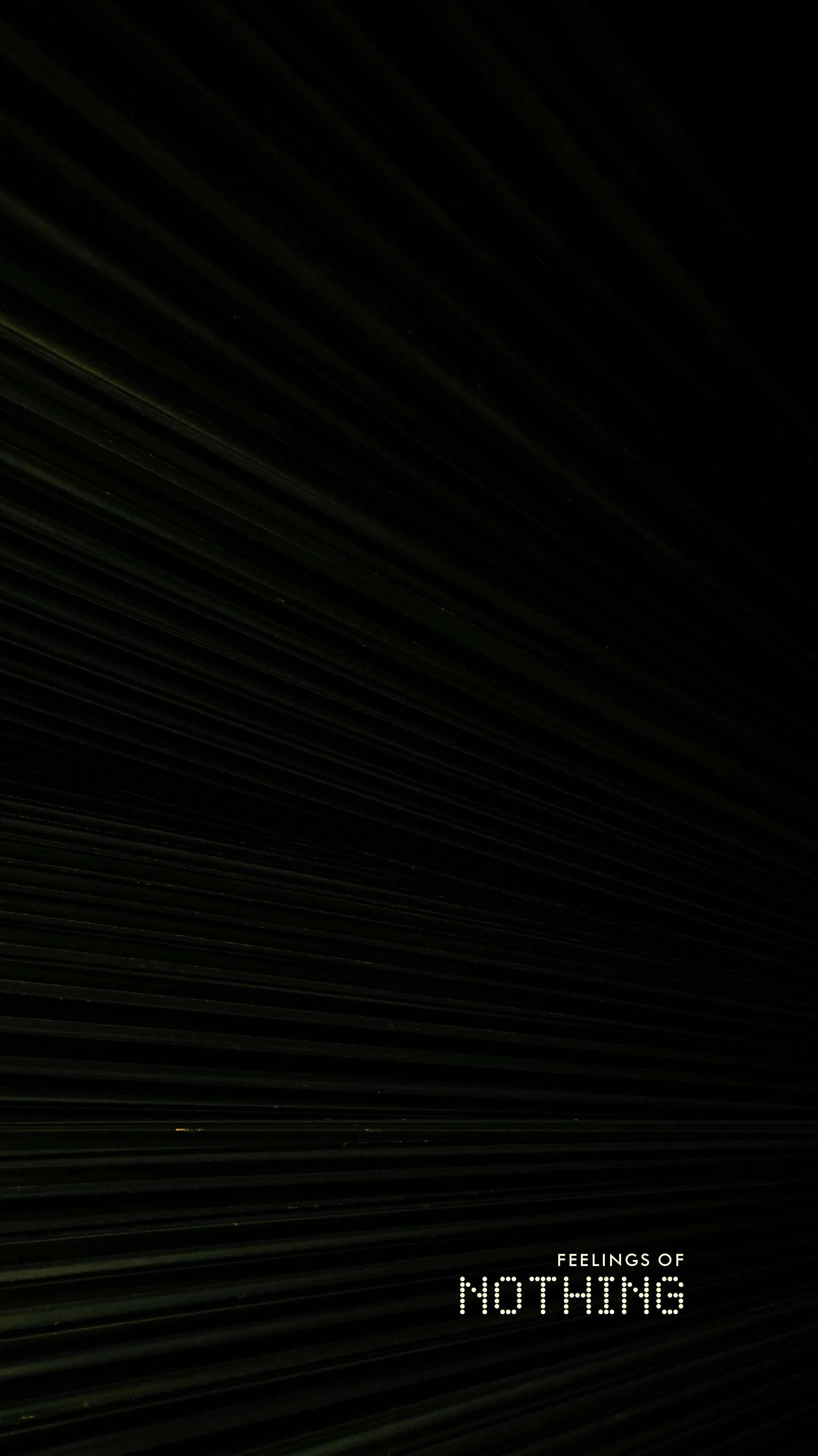 Faint green striations radiate from the upper left across an otherwise black screen, with small type sitting in the lower right corner.