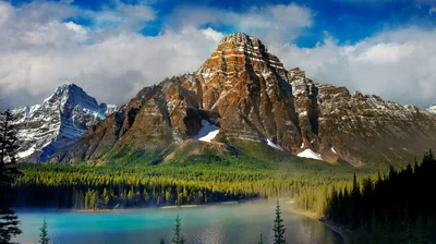 Castle-Like Peak Over a Glacial Lake HD Wallpaper
