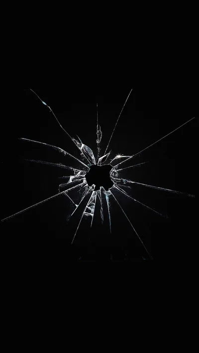 Cracked Hole in Black Glass HD Phone Wallpaper