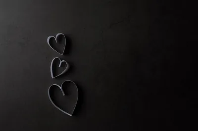 Three Grey Paper Hearts on Slate HD Wallpaper