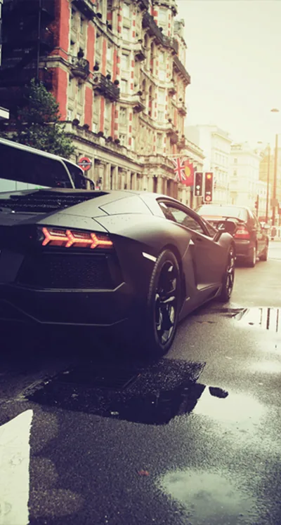 Matte Aventador on a Wet City Street HD Phone Wallpaper