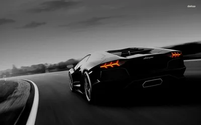 Rear of a Black Lamborghini at Speed HD Wallpaper