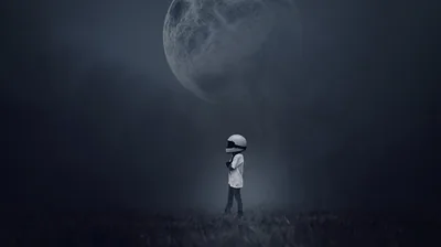 Astronaut Boy Under a Giant Moon HD Wallpaper