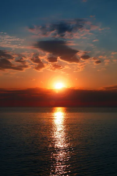 Setting Sun Between Dark Clouds HD Phone Wallpaper