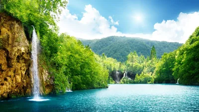 Twin Waterfalls in a Forest Lagoon HD Wallpaper