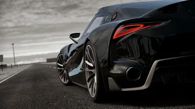 Tail Light and Rear Wheel on an Empty Road HD Wallpaper