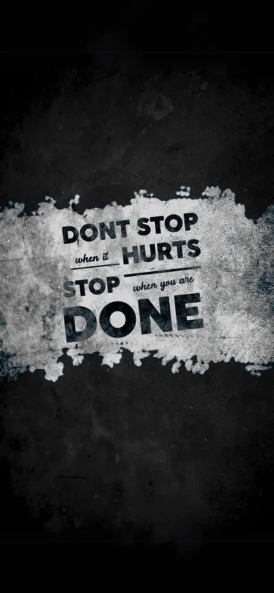 Don t Stop motivational quote on dark textured background