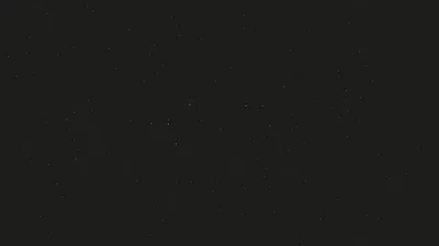 Charcoal Field with Faint Dust Specks HD Wallpaper