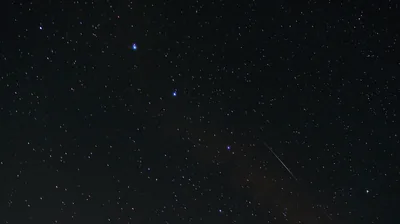 Meteor Streak Across a Starry Night HD Wallpaper